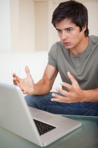teen with autism talks to his autism therapist during online autism therapy in California with Open Doors Therapy