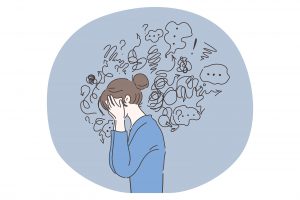 A graphic of a woman covering her face while surrounded by cluttered thoughts. Learn how neurodiverseity affirming therapists in Silicon Valley can help by searching for autism therapy South Bay area. An autism evaluator in Palo Alto, CA can offer counseling for autistic adults and other services.